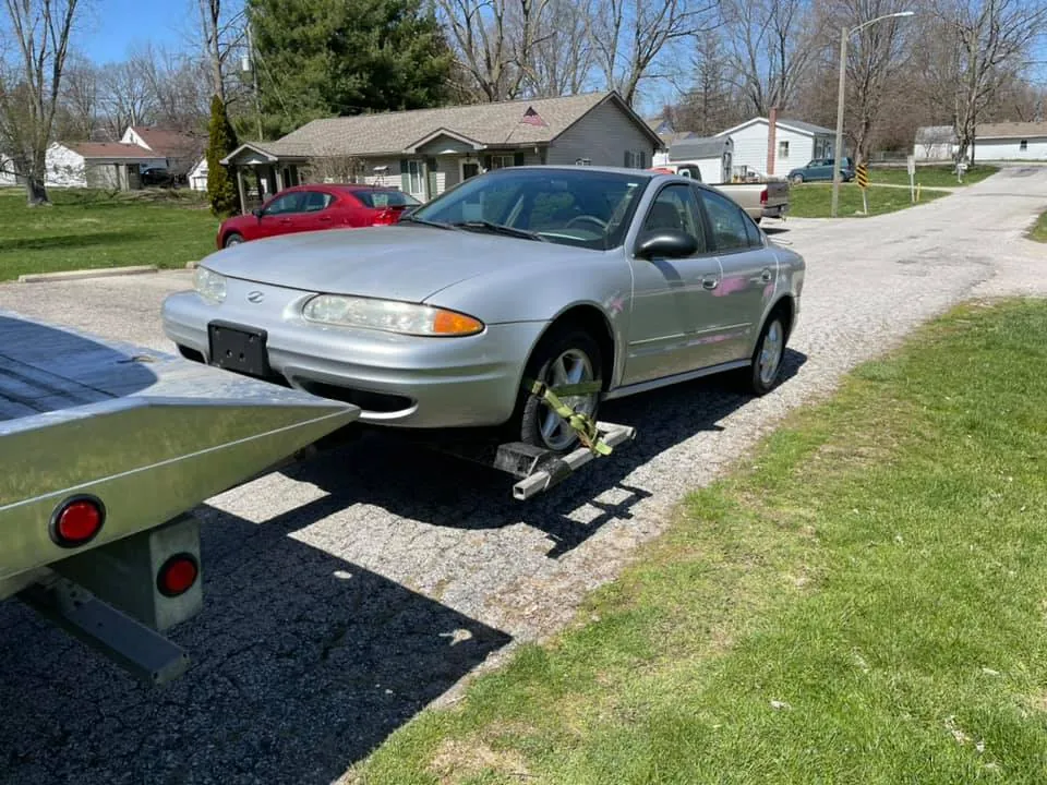 Older junk car in Indianapolis being sold for cash without a title